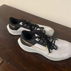 Nike Black White and Gold sneaker size 9